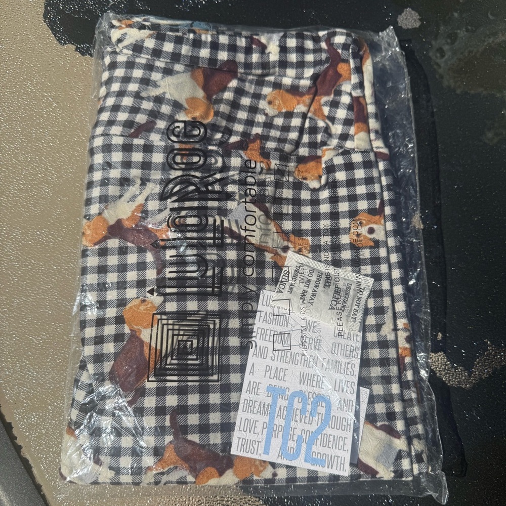 LuLaRoe Black and White Plaid Leggings with Brown Accents